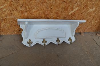 (n-7051) Valge mütsiriiuliga seinanagi