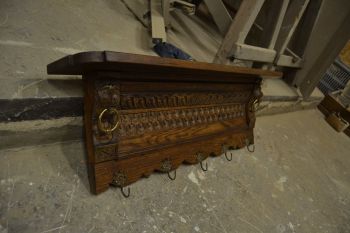 (n-7580) Mütsiriiuliga lõvipeadega riidenagi