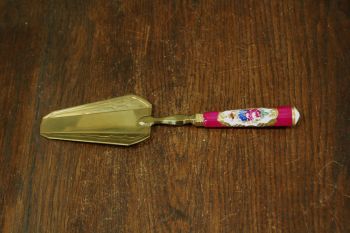 (n-7841) Portselanist käepidemega lilleline tordilabidas